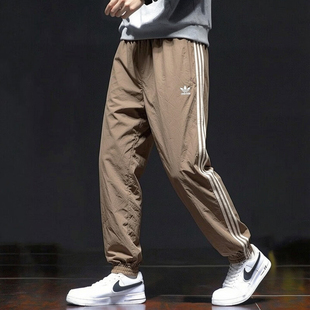 adidas三叶草梭织运动裤男裤子夏季新款透气三条纹篮球薄款束脚裤