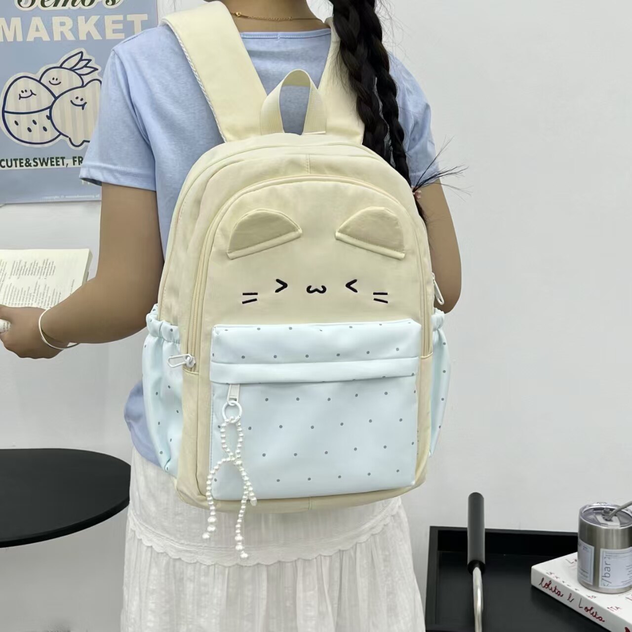 沐沐休闲女孩大容量初高中小学生书包百搭双肩背包可爱小猫星星