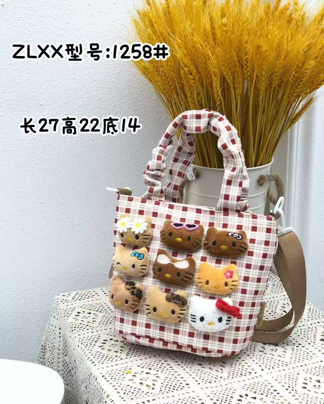儿童学生可爱卡通手提水桶包kt猫玩偶女孩旅游时尚格纹单肩斜挎包