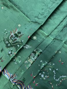马面裙布料 深绿色彩色色织提花定位织金蟒纹面料
