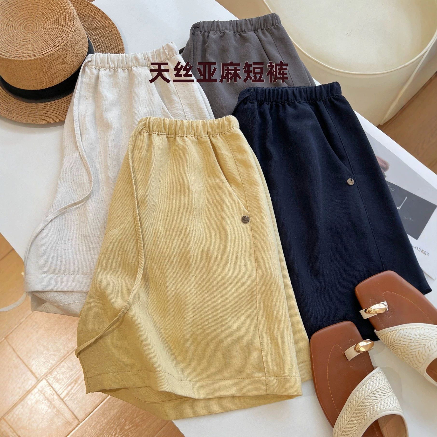 天丝亚麻透气女大码遮胯显瘦短裤图片