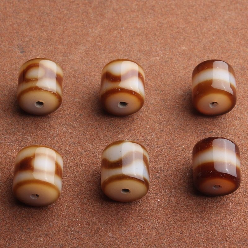 西藏天然玛瑙至纯虎牙天珠台珠白芯一线三眼老型桶珠光面配饰散珠