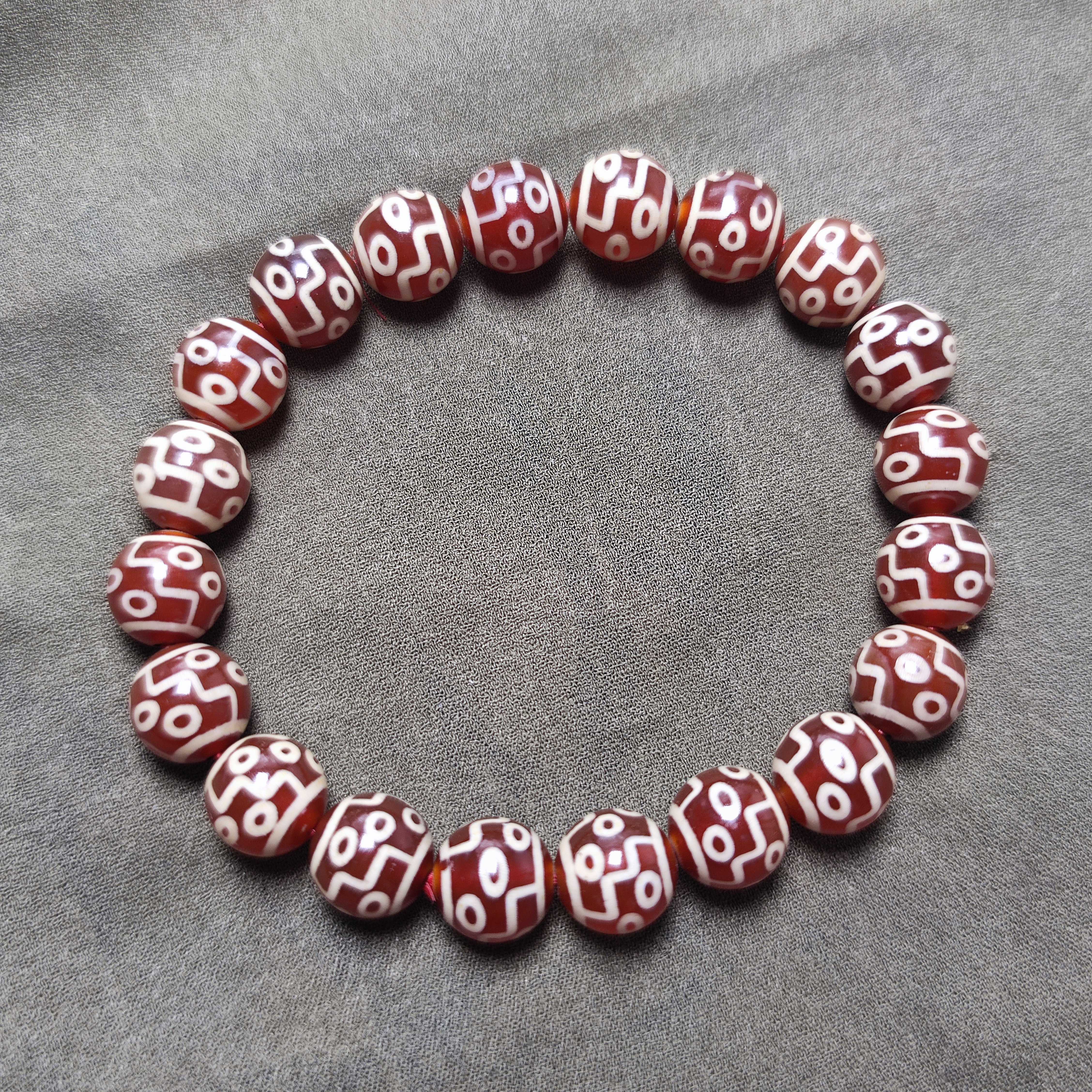 九眼天珠红肉玛瑙单圈手链10毫米