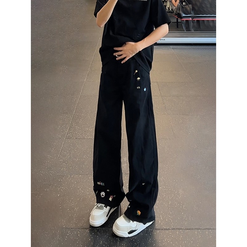 黑色刺绣弯刀牛仔裤男款