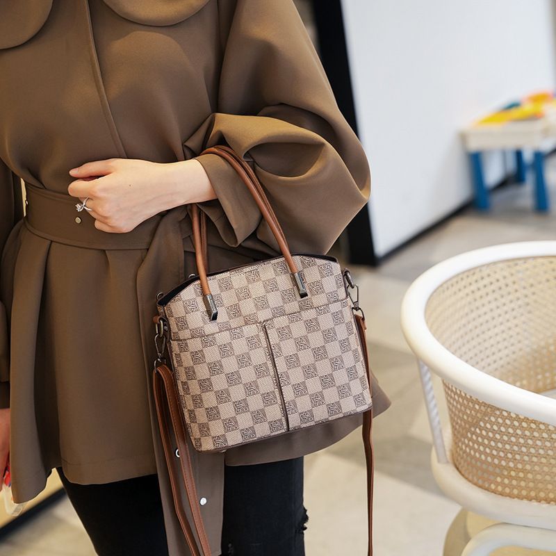 柒只蚁服饰甄选水桶包女大容量2025新款手提包百搭高级感小众女包