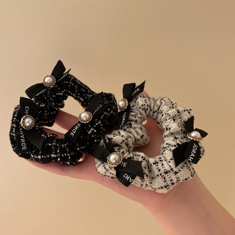 暗夜黑山茶高级感小香风蝴蝶结珍珠头绳2025年新款皮筋女不伤发绳