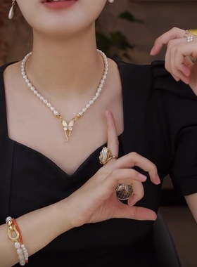 新款珍珠蝴蝶结吊坠项链女款轻奢小众高级感锁骨链百搭毛衣链配饰