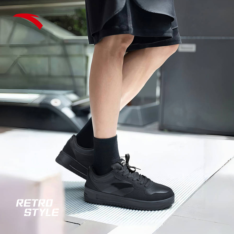 安踏全黑板鞋厚底皮面防水小白鞋