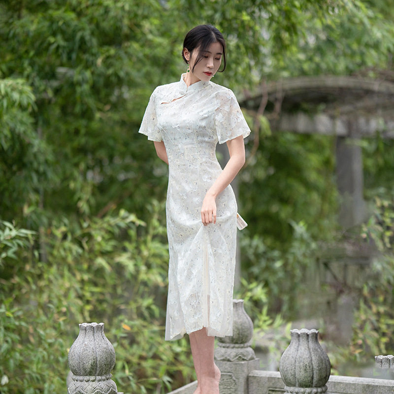 绿色鱼尾旗袍2025新款感年轻款日常小清新中国风连衣裙女秋季