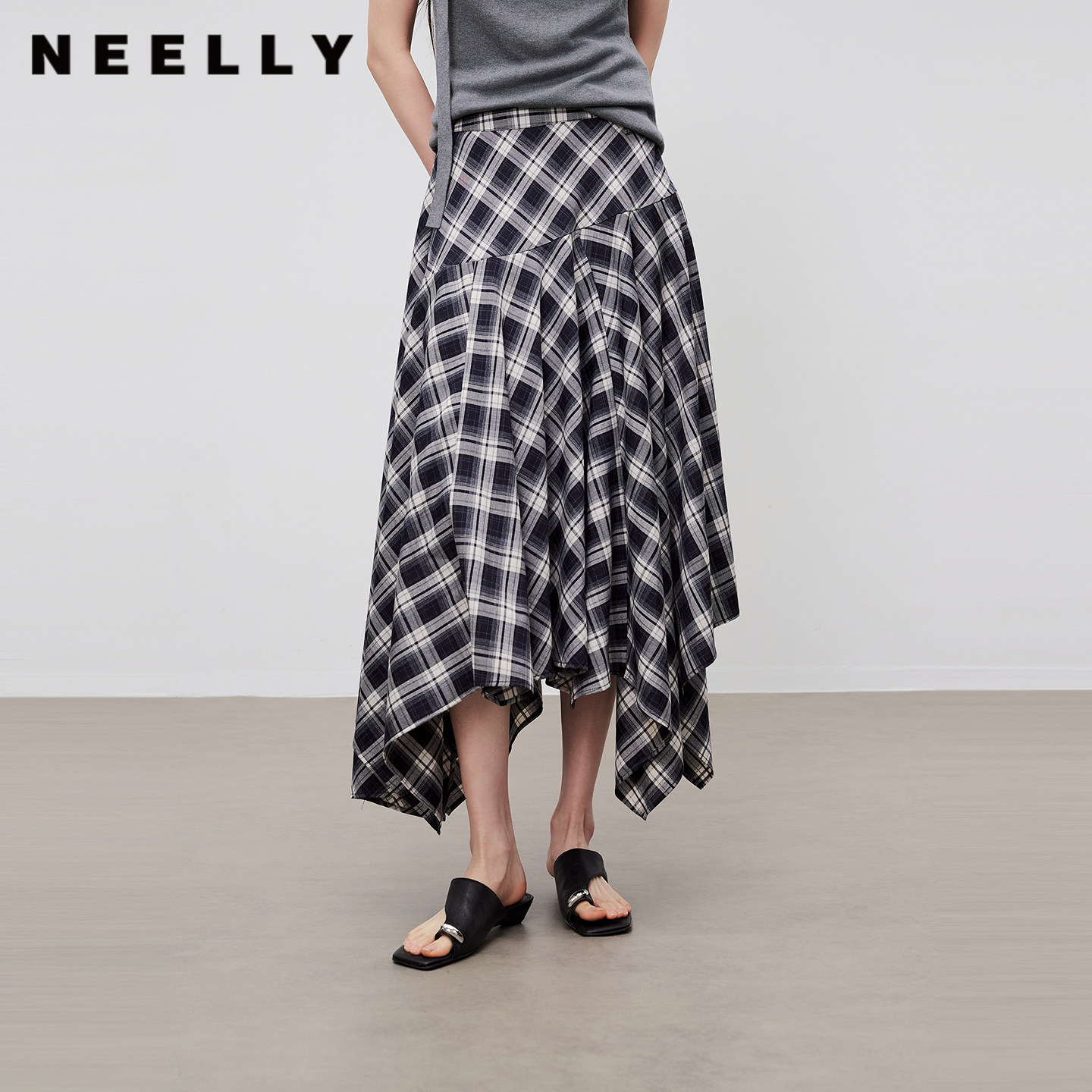 NEELLY纳俪商场同款夏新款不规则格纹半身裙女复古百搭大摆中长裙