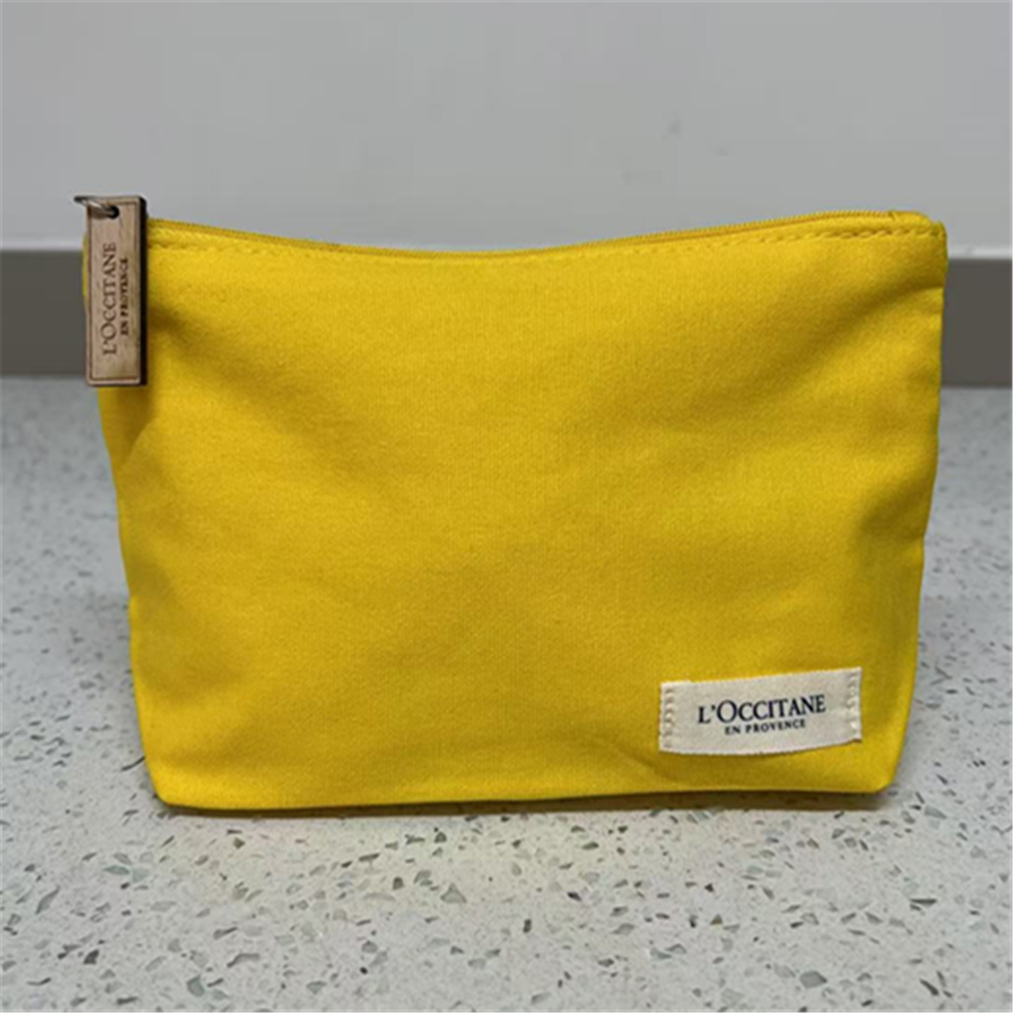 包邮欧舒丹黄色化妆包收纳包布艺手拿包便携零钱包手拿包化妆袋