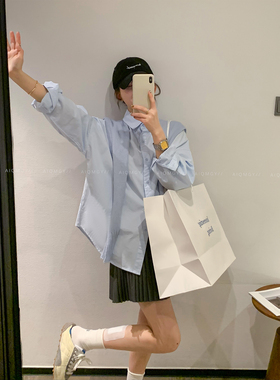 爱情魔鬼鱼 蓝色长袖披肩衬衫女2026年春季新款通勤宽松时尚上衣