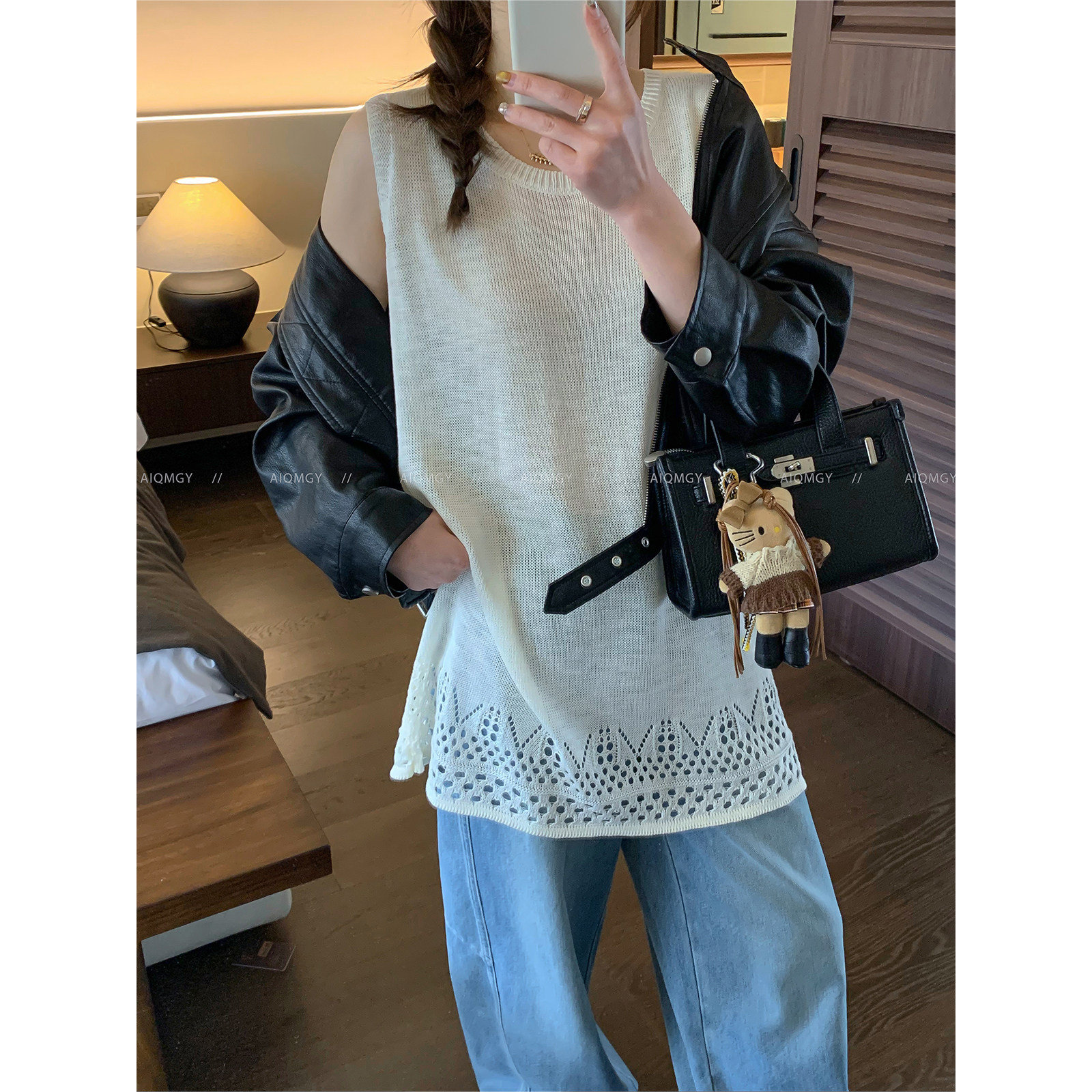 爱情魔鬼鱼 纯色设计感圆领镂空针织背心女2026年夏季中长款上衣