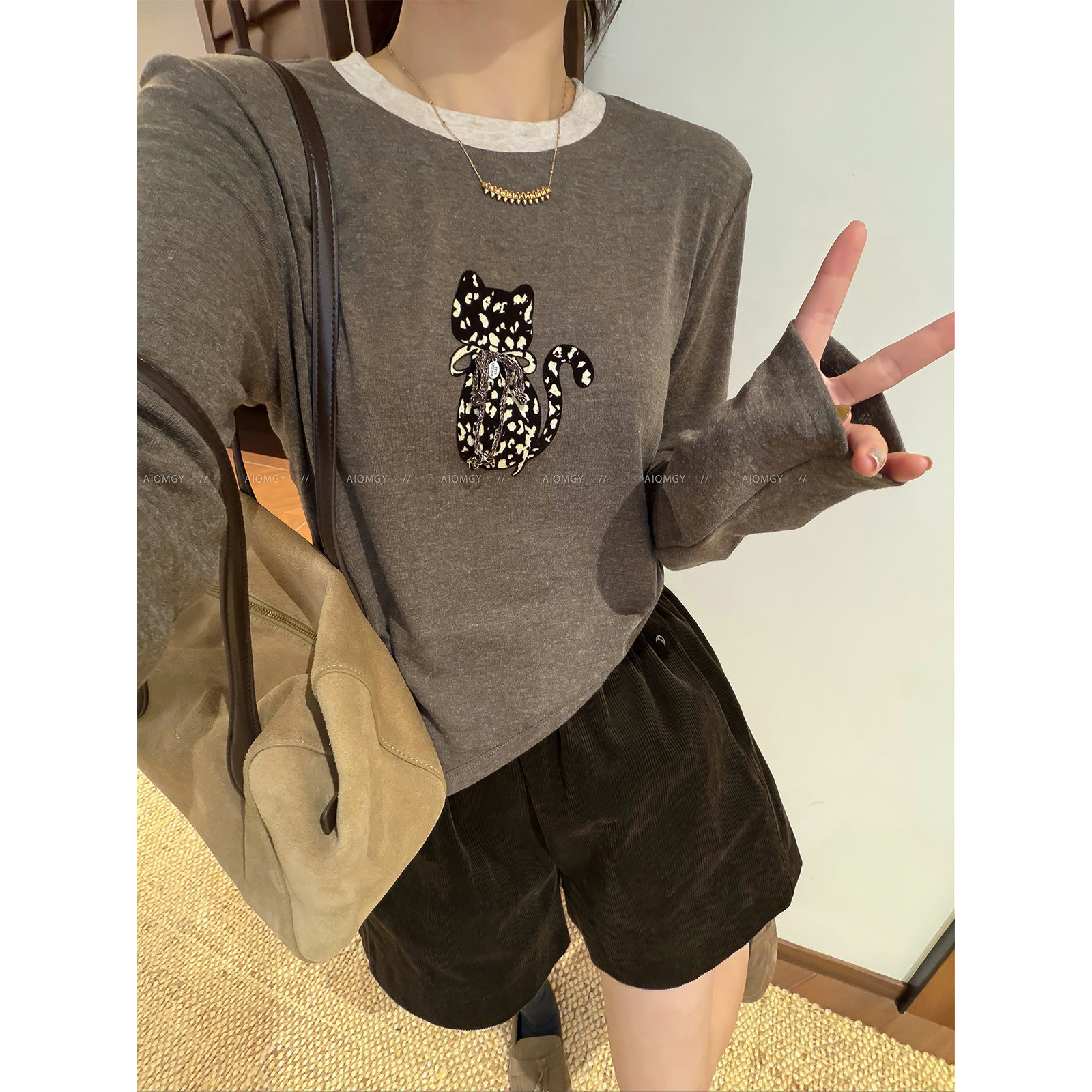 爱情魔鬼鱼 咖色撞色圆领长袖卡通印花T恤女2026秋季新款休闲上衣