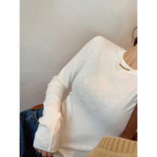 爱情魔鬼鱼 白色长袖圆领T恤女2026春季新款修身显瘦百搭内搭上衣