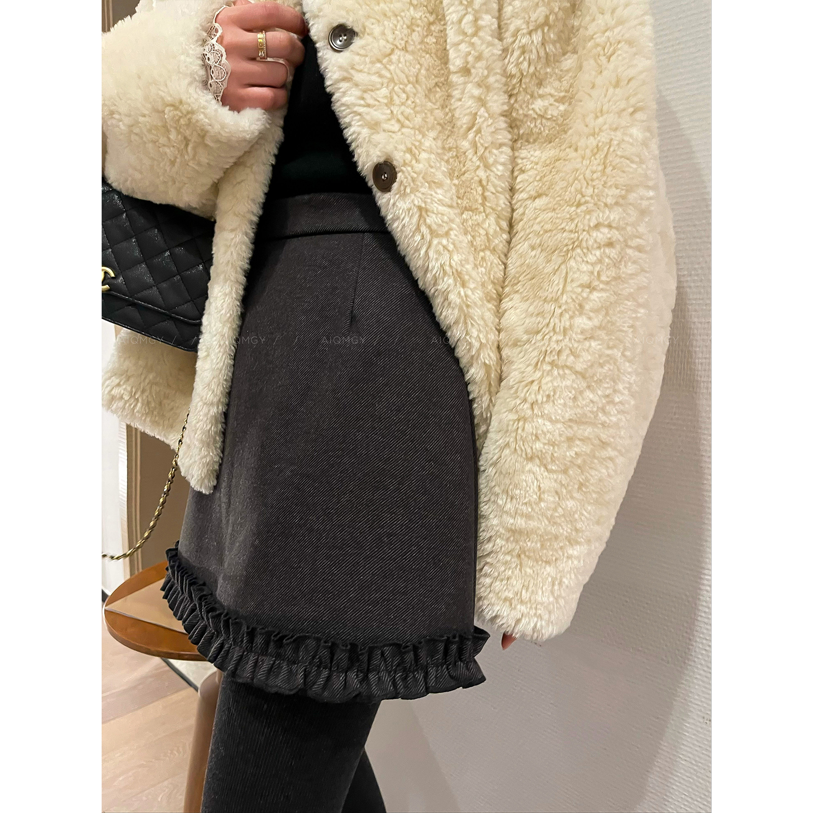 爱情魔鬼鱼 深灰色木耳边拼接A字裙半身裙女2025冬季新款百搭短裙