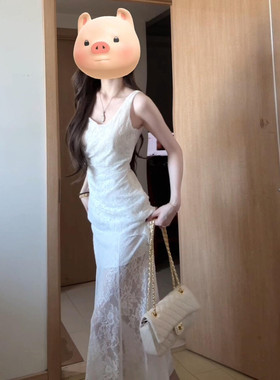 白色蕾丝吊带洋装子女夏季2026新款法式气质高级感修身包臀长裙