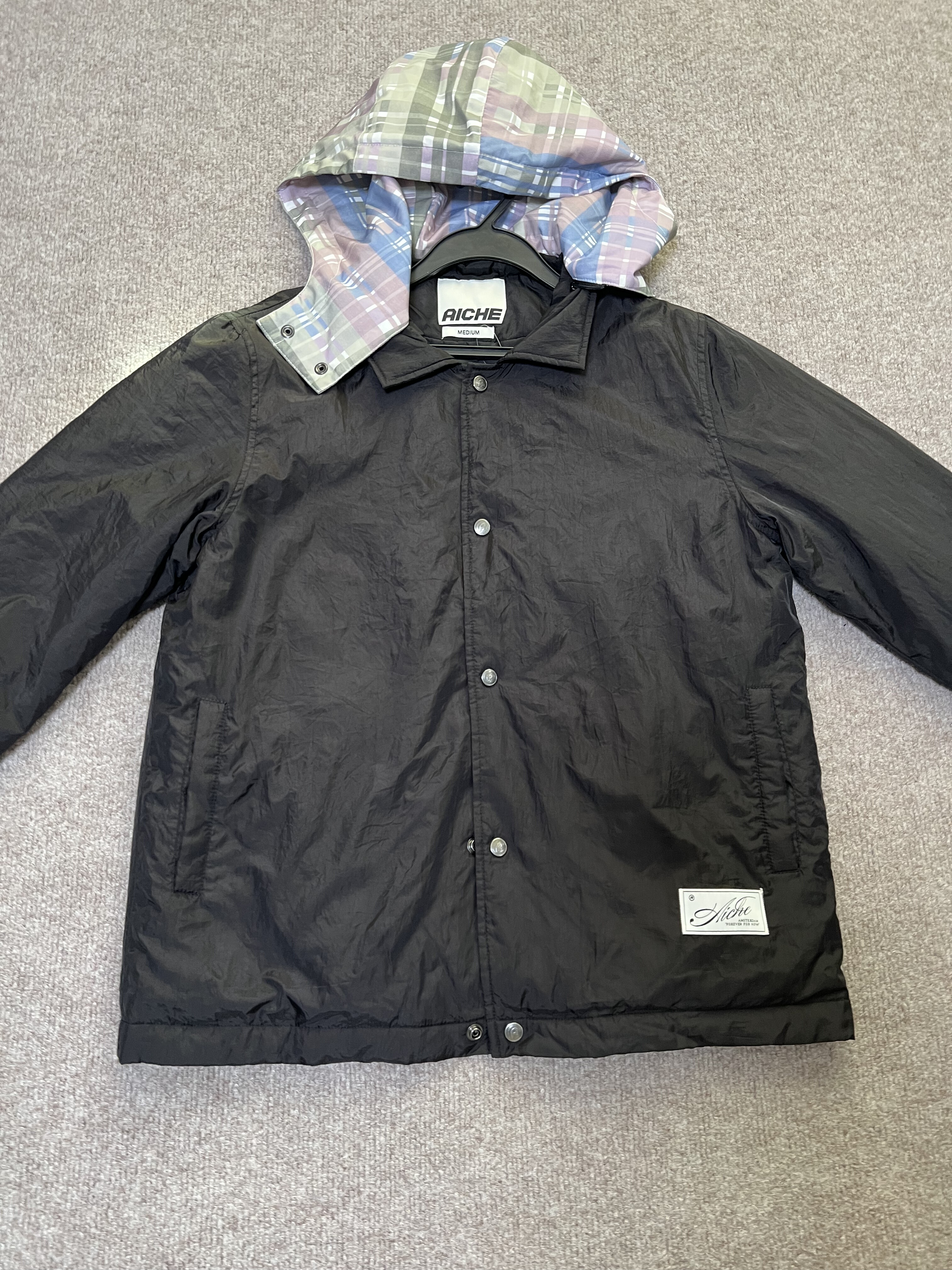 荷兰潮牌A 男生秋冬款 黑色格纹帽子拼接 舒适休闲直筒夹克棉服