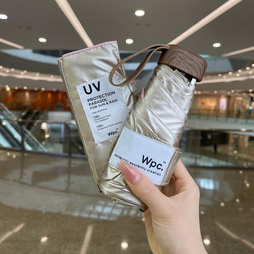 wpc.遮阳伞纯色彩胶五折防晒迷你