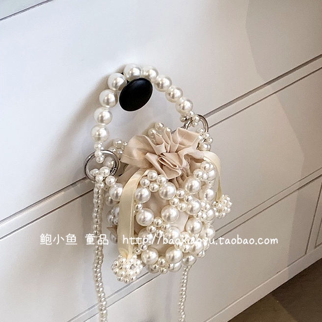 小香风手工编织镂空珍珠手提包包
