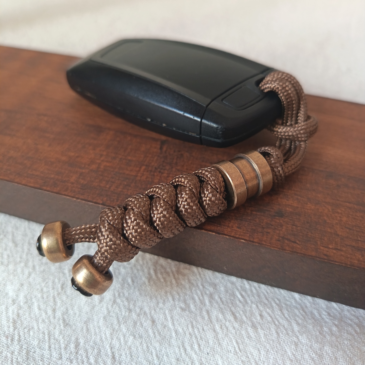 黄铜圆柱编织伞绳挂件车钥匙扣