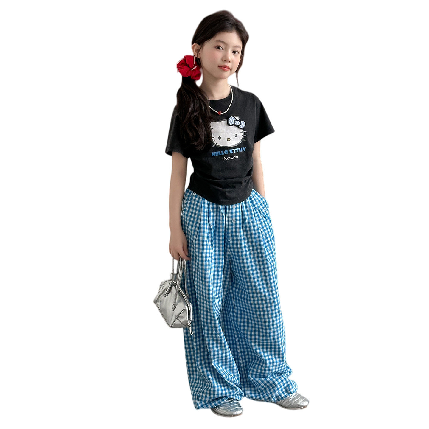 女童蝴蝶结格子裤套装中