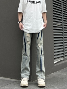 COCKTAIL小众设计感撞色喷印破洞牛仔裤男宽松直筒潮牌宽松长裤子