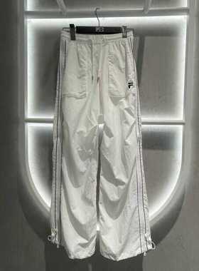 FILA斐乐潮牌女装 2025秋季新款潮流运动宽松梭织长裤 T11W435802