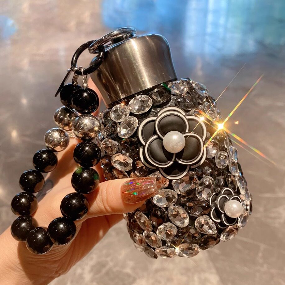 山茶花带钻石保温杯女士高颜值大肚杯不锈钢轻奢镶钻水杯2026新款