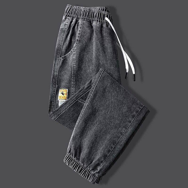 男士牛仔裤春秋款2026新款哈伦束脚九分休闲抽绳松紧腰裤子男春季