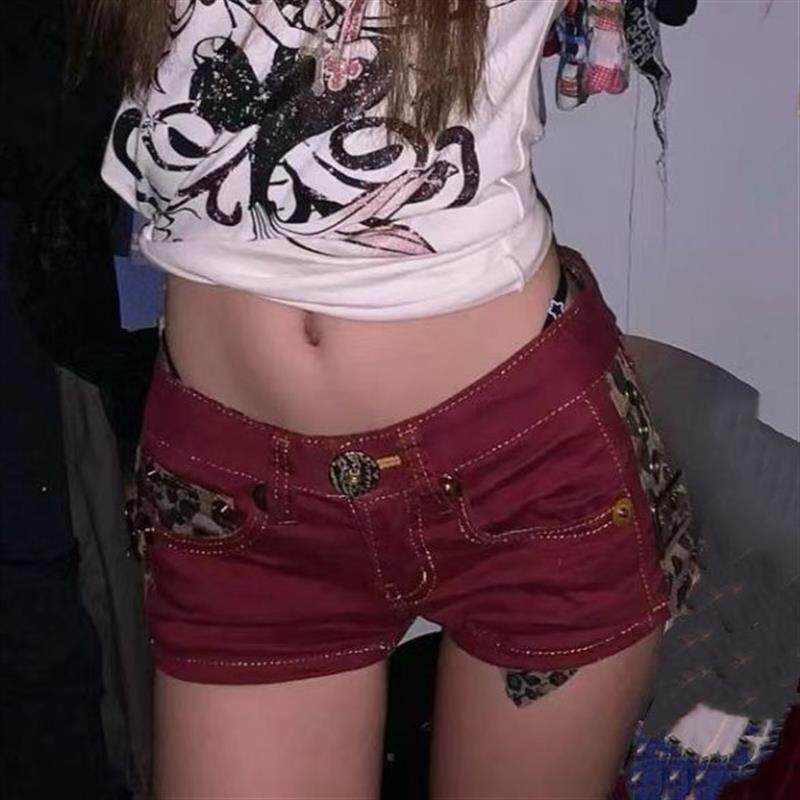 辣妹风低腰牛仔超短裤女网红新款紧身包臀水洗豹拼接纹美拉德热裤