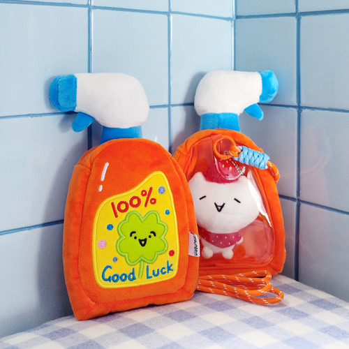 雨过山原创橘色好运喷雾零钱痛包