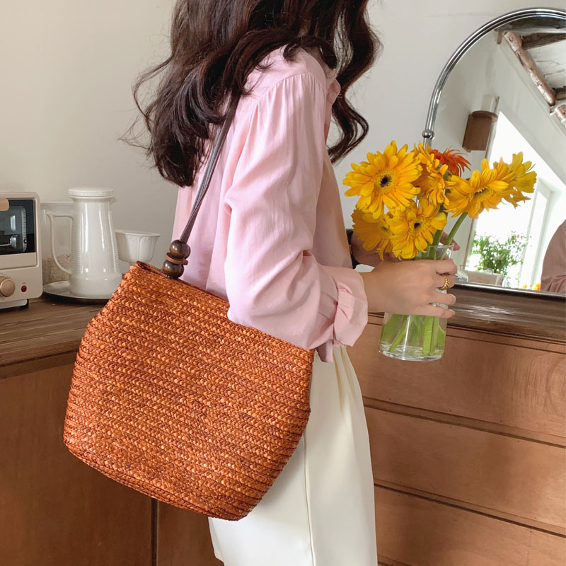 里洛家手工编织草编包单肩水桶包