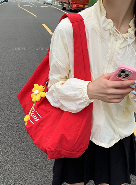 大容量红色帆布包包女式2025新款单肩包休闲百搭通勤松弛感托特包