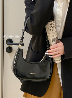 高级感小众设计黑色包包女2025新款时尚单肩手提包质感腋下饺子包