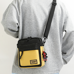 男士包包单肩包运动小男包手机包旅行斜挎包帆布男款外出便携背包