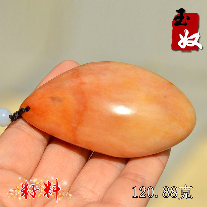 新疆天然金丝玉/藕粉俏红黄地表籽料水滴原石/鱼/手把件/120.88克