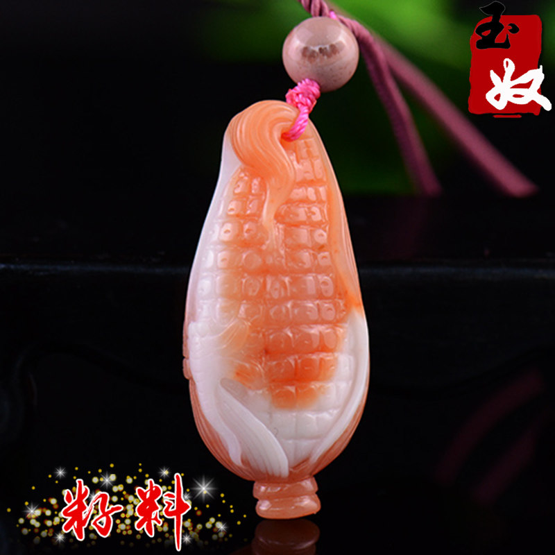 新疆天然俏色吊坠金丝玉图片