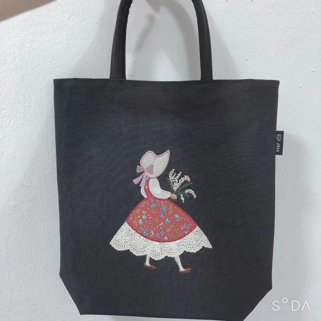 简约刺绣花裙子拉链手提款女包包