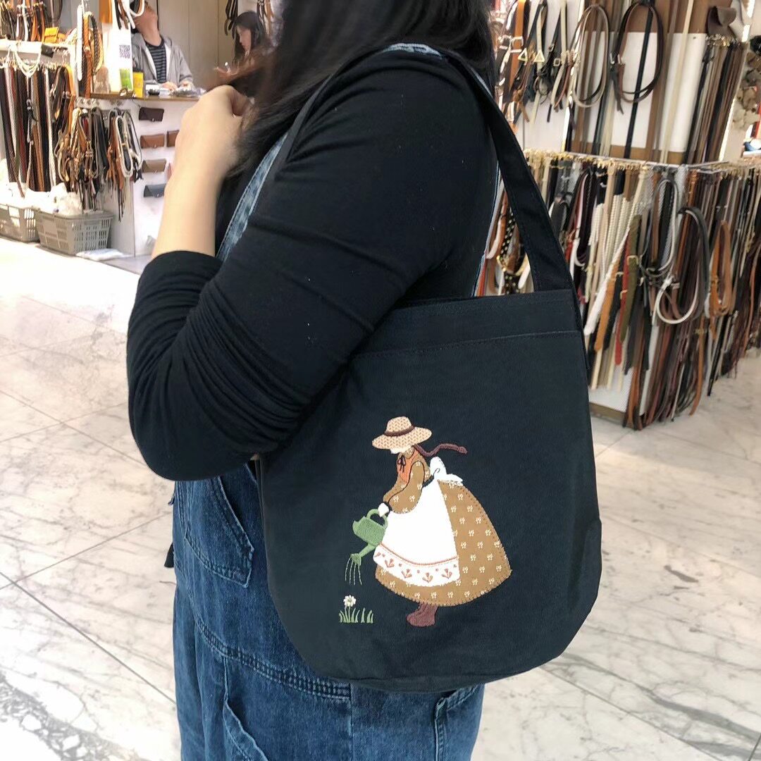 拼色刺绣花裙款手提女包包单肩