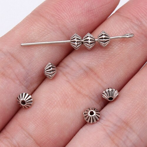 40个/包 4.8x4.8x3.6mm 双面雕花锥形小孔珠隔位珠 ABD-C16252