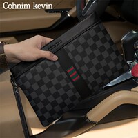 Cohnim kevin男士手包轻奢名牌高档手拿包休闲潮牌真皮手抓信封包