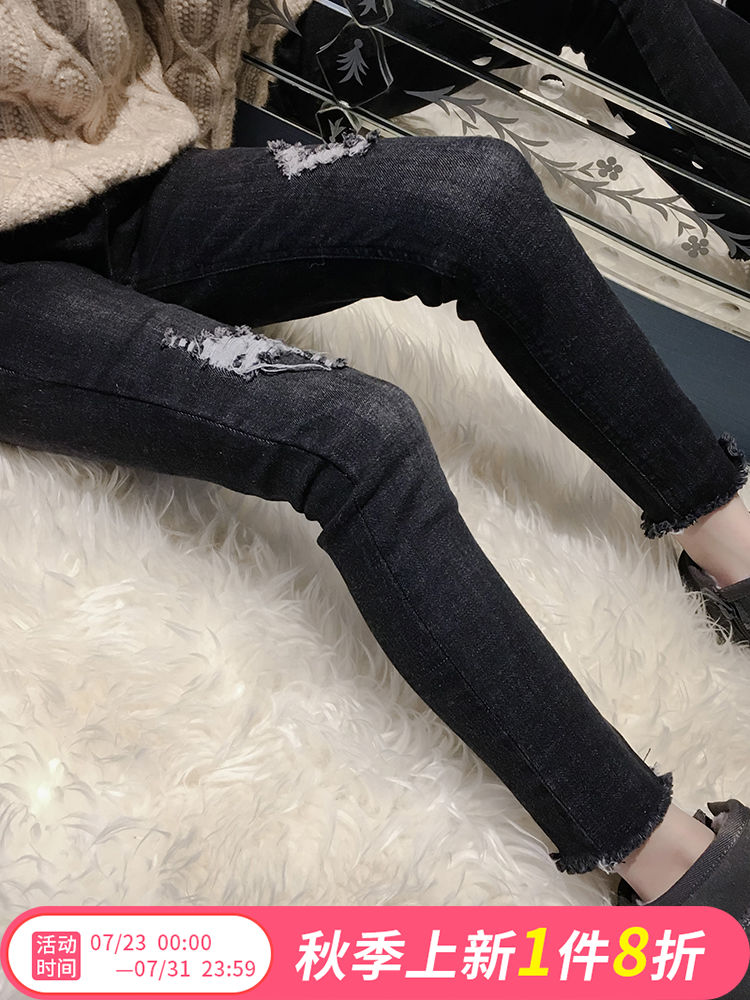 Girls ' black burst jeans spring and autumn 2020 new children's foreign school wear big children's tight narrow tube pants