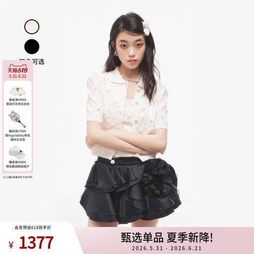 新款时尚绣花针织上衣