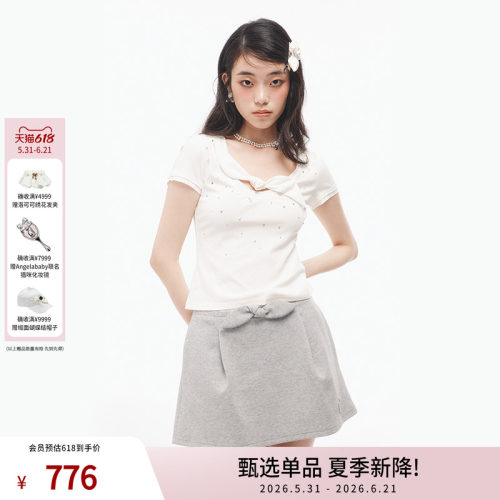 时尚兔耳朵钉珠上衣女
