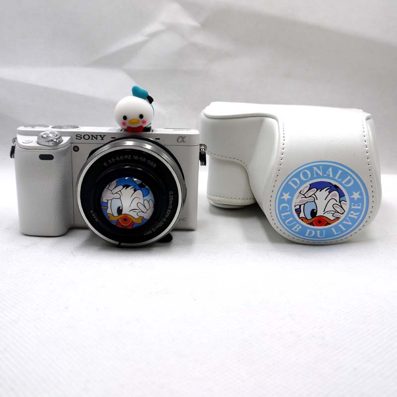 唐老鸭可爱相机包适合索尼A6400ZVE10佳能M50M6M200相机套保护套