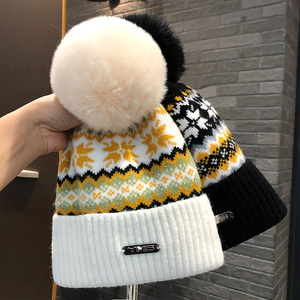 冬季毛线帽子冬女韩版潮圣诞雪花毛球针织帽加绒保暖套头白色冷帽