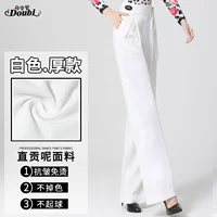 Плотные белые женские брюки с завязкой спереди.