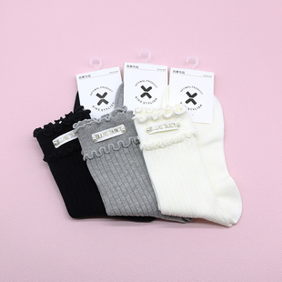 西客优品秋冬时尚 木耳边珍珠皮标甜美纯色中高筒成人女袜252M2927