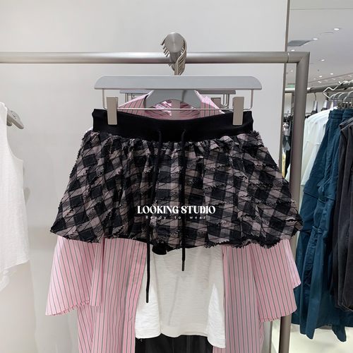 UR&DC2025秋季新款设计感休闲松紧腰抽绳破洞毛边A字短裙叠层半裙